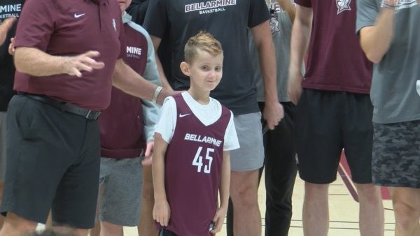 Steve Walsh smiles while wearing his Bellarmine jersey